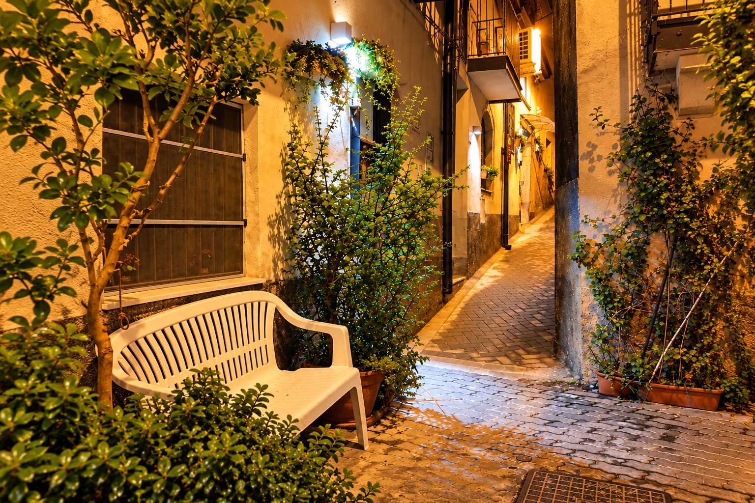 An evening-lit lane in the San Basilio quarter of Graniti